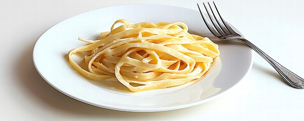 Creamy Fettuccine Alfredo on a White Plate