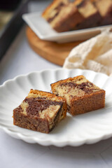 Slices of marble cake on white plates