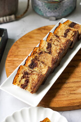 Slices of marble cake on white plates