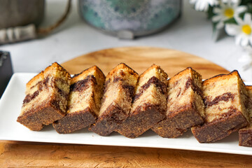 Slices of marble cake on white plates