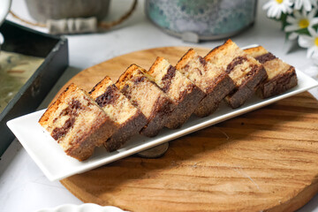 Slices of marble cake on white plates
