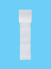 Toilet paper roll on blue background