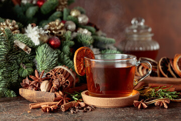 Christmas herbal tea with cinnamon, anise, and slices of dry citrus.