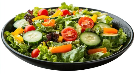 Fresh salad with mixed greens, cucumbers, cherry tomatoes, and bell peppers on a dark plate.