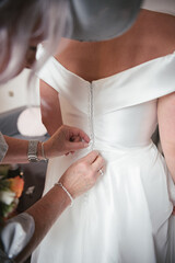 A bride getting her final adjustments 