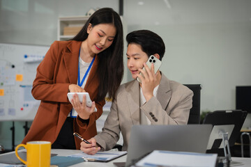 Fototapeta premium business team hand using calculator to calculate home finance, accounting with laptop computer on table, budget management, monthly expenses. Doing finance, budgeting and tax calculation.