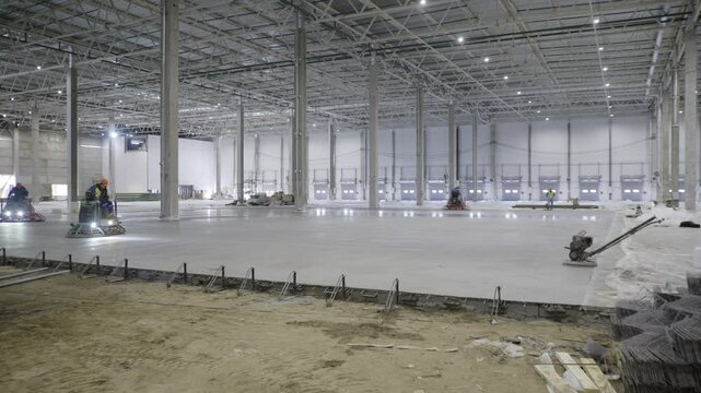 Currently Under Construction Concrete Flooring Installation at the Construction Site. Clip