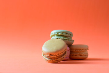 Close up. French sweet and assortment of macarons, varied and colored.