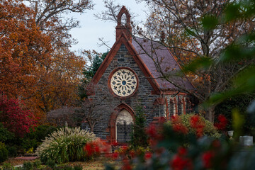 Chapel on a Cemetery during Fall with colorful Foliage, moody Look - Oak Hill Cemetery in Washington, DC