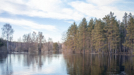 Calm lake with trees in the background