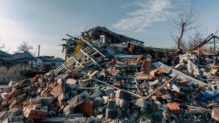 destroyed and burned houses in the city in Ukraine