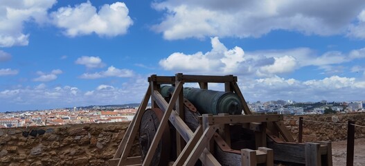Fototapeta premium Scenic View of Historic Coastal City with Ocean and Red Roofs 