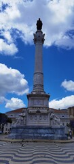 Fototapeta premium Scenic View of Historic Coastal City with Ocean and Red Roofs 