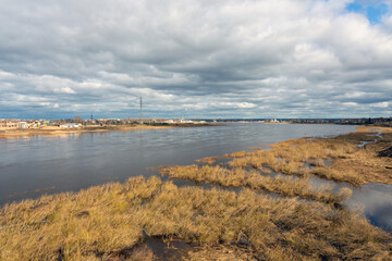 Landscape of early spring, flood, the Sukhona river overflowed in Veliky Ustyug, Vologda region, Russia