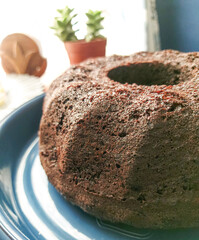Close up for chocolate cake in plate on table