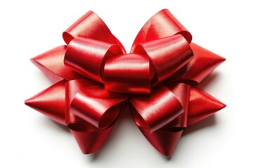 Striking aerial image of a vibrant red gift ribbon bow set against a pure white background, perfect for holiday decor and gift wrapping ideas.