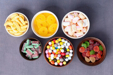 Mix of colorful candies . Top view