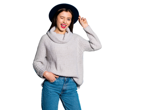 Photo of pretty lady winking eye going to party wear vintage hat knitted pullover isolated blue background