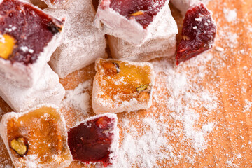 Sweet food Turkish delight, assorted rahat locum in form of cubes with nuts and powdered sugar, traditional food