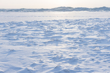 Winter landscape with ice and snow of frozen Baltic sea