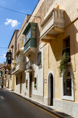 a beautiful iconic cityscape view through the small and the narrow streets of Mdina, Malta. 