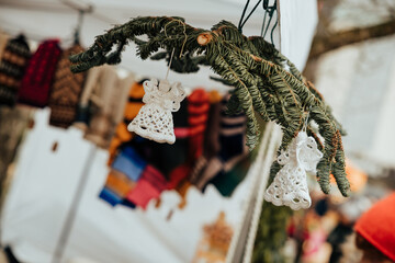 Handmade Crochet with Angel Decorations Hanging on Fir Branch
