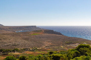 coastline view of the Ras in-Niexfa Bay in Malta at a clear blue sky summer day