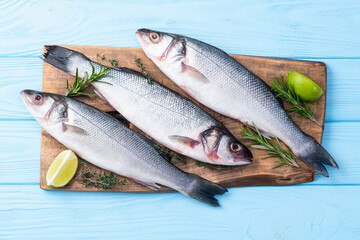 Raw sea bass fish photography . Top view