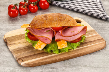 Sandwich ciabatta with mortadella and cheese