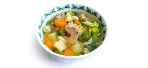 Sayur sop or vegetable with meat soup on the plate. indonesian popular culinary. Healthy food