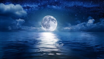 A full moon illuminates the ocean at night, reflecting on the water's surface with clouds and stars in the sky