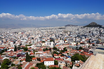 Fototapeta premium Häusermeer von Athen, Griechenland, Stadt, Anblick von oben, Luftbild, Ortsbild, Architektur, Haus, Europa, Hauptstadt, Himmel, Wolken