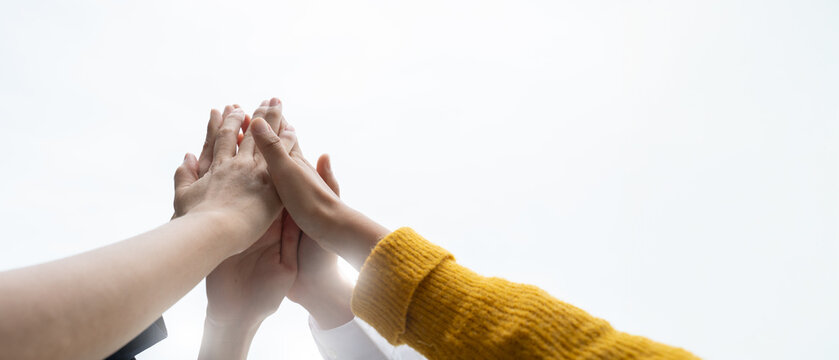 Panoramic Teamwork,empathy,partnership and Social connection in business join hand together concept.Hand of diverse people connecting.Power of volunteer charity work,Stack of people hand.
 - Powered by Adobe