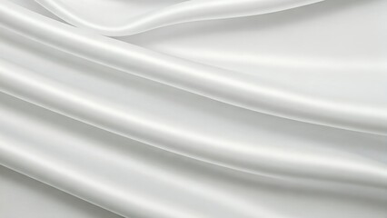 Fototapeta premium Smooth white silk fabric drapes elegantly. This close-up shot showcases the soft, flowing texture of white silk fabric.