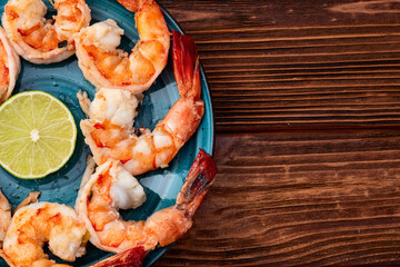 Grilled Tiger shrimps with lime photography . Top view