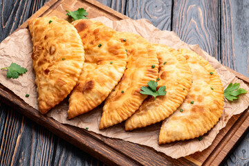 Snack chebureks. Pasties with meat photography . Top view
