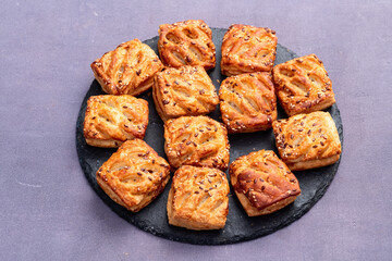 Homemade mini puff pastries with meat photography . Top view