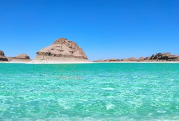 Green salty lake in the middle of desert 