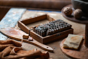 Vintage Crafting Tools for work with clay and Accessories Amidst a Rustic Table 