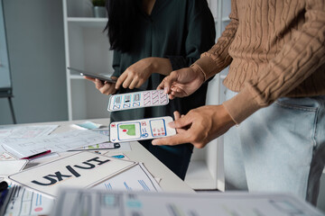 Creative UX UI Design Process with Designers Collaborating on Innovative Digital Interfaces and Wireframes