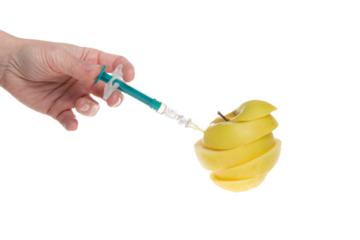 Apple cut receiving an injection for rapid ripening hand holding syringe on isolated white png transparent background