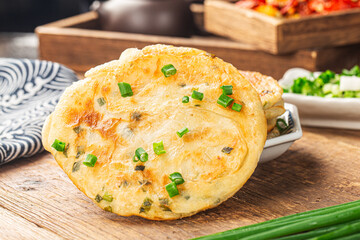 Green onion pancakes are a fried Chinese flatbread often eaten as a snack or with a meal.
