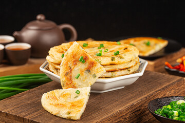 Green onion pancakes are a fried Chinese flatbread often eaten as a snack or with a meal.