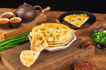 Green onion pancakes are a fried Chinese flatbread often eaten as a snack or with a meal.