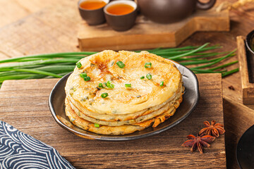 Green onion pancakes are a fried Chinese flatbread often eaten as a snack or with a meal.