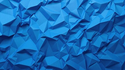 Obraz premium Crumpled blue paper, geometric abstract texture, origami-inspired background