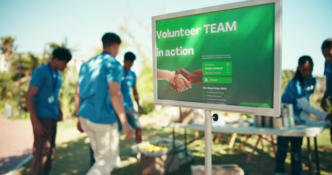 People, volunteer and teamwork in park with boxes for donation, community service and outreach program. Team building, outdoor and collaboration with care for charity, NGO and change in New York