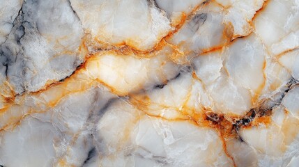 Polished cream marble stone texture with golden veining for elegant interior design applications