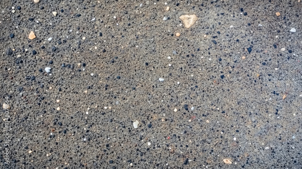 Aufkleber dark textured cement floor with speckled details for use in abstract backgrounds and designs.