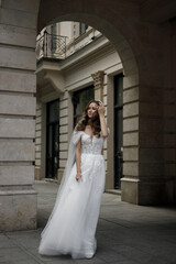 A Beautifully Elegant Bride Styled Delightfully in a Striking Architectural Urban Setting